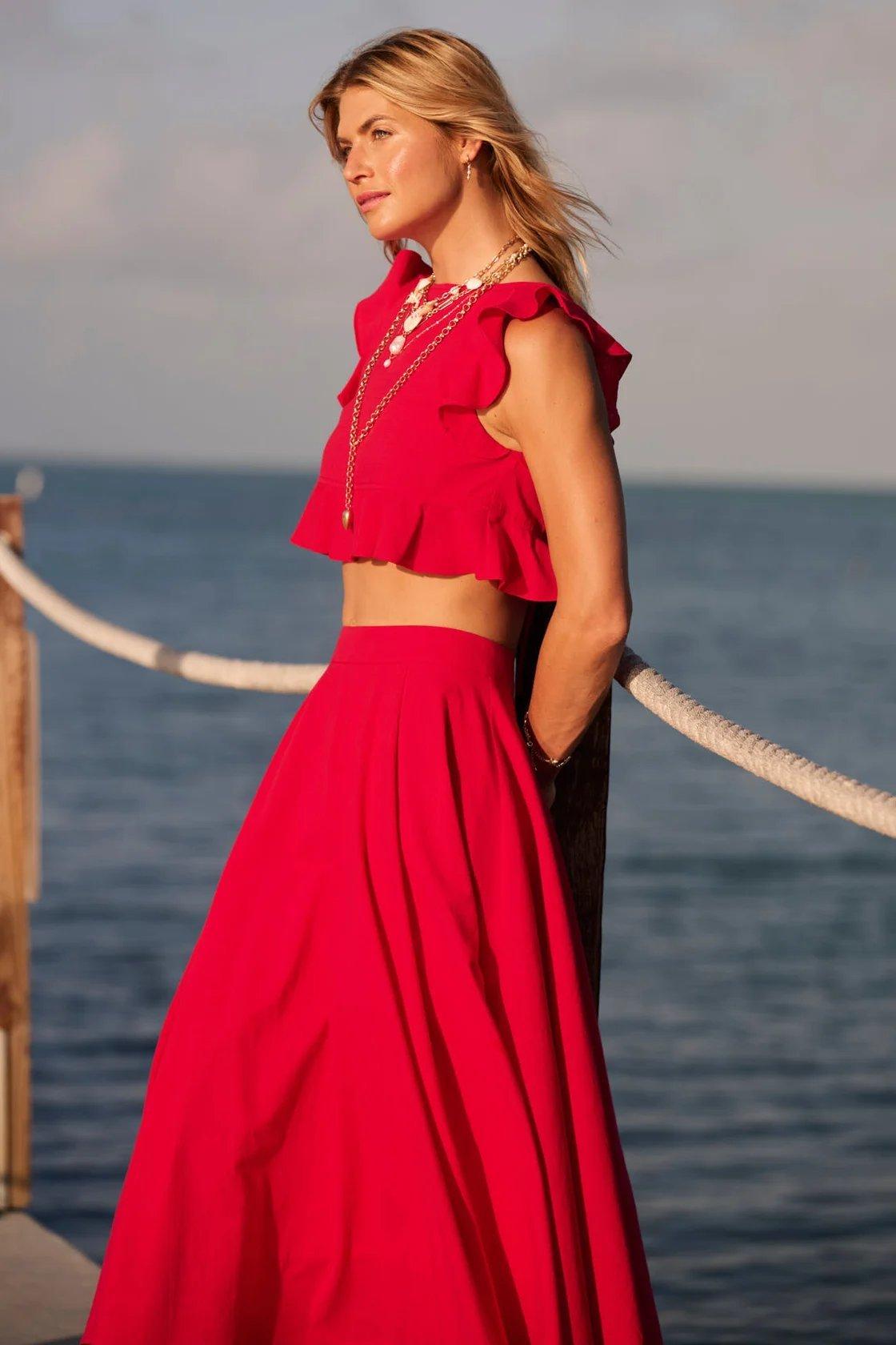 Girl wearing a red linen midi skirt