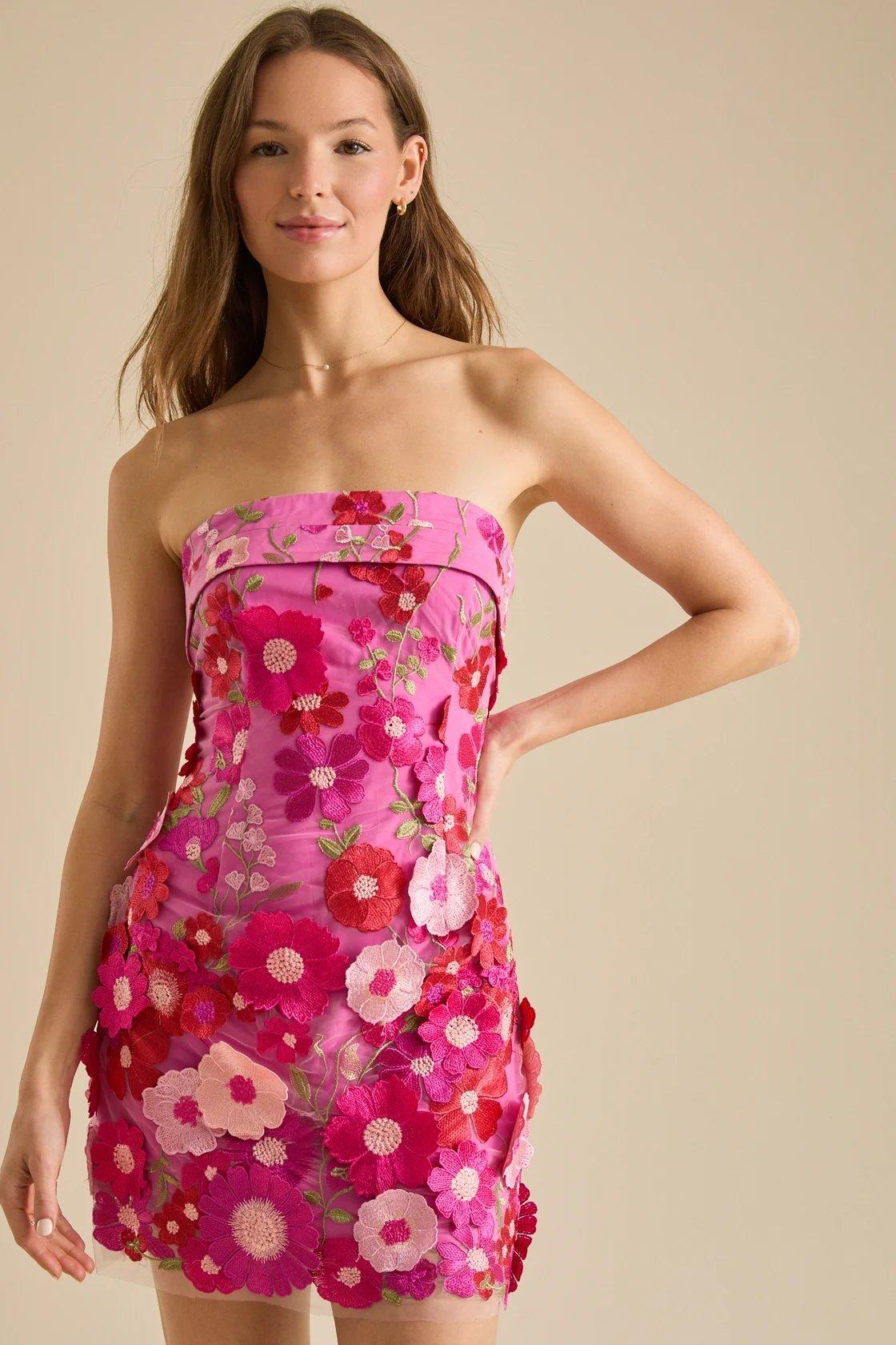 Girl wearing an pink floral mini dress
