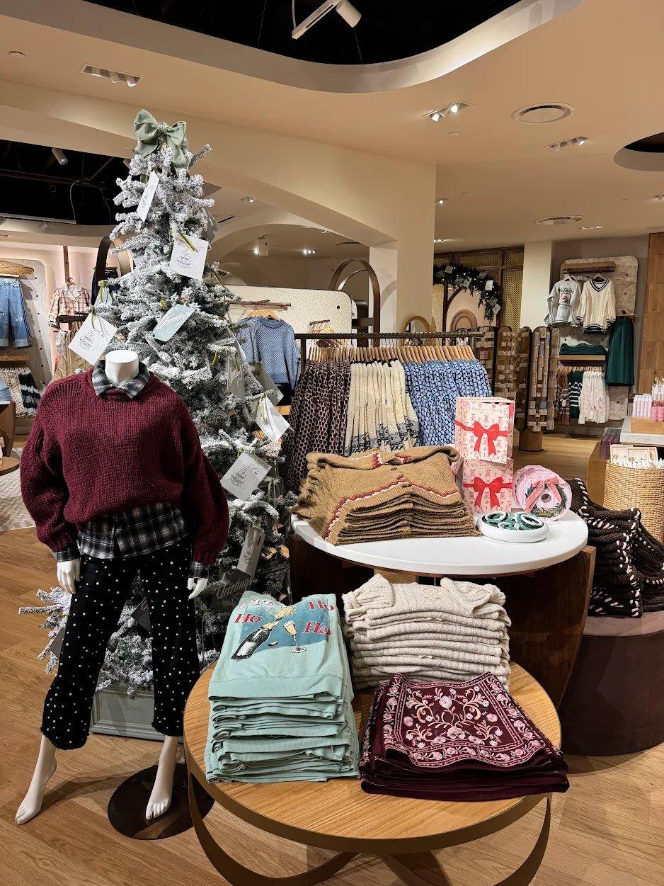 Table filled with folded merchandise