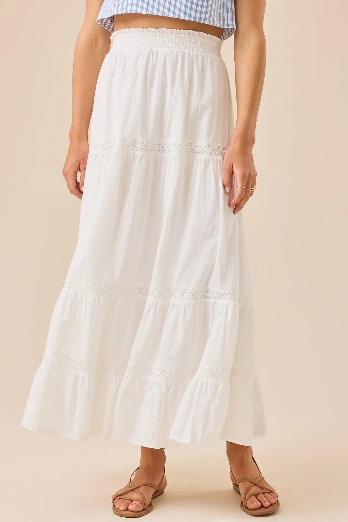 girl wearing a white maxi skirt