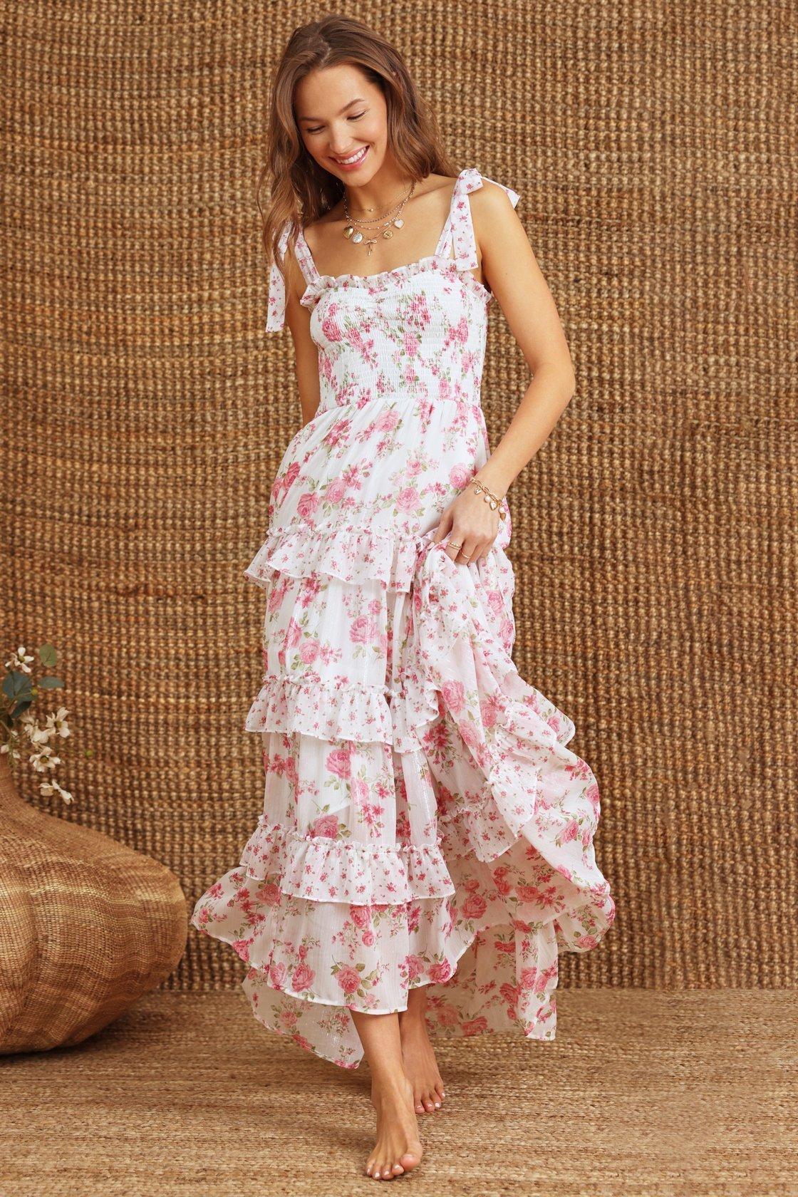 girl wearing an ivory and pink layered floral maxi dress