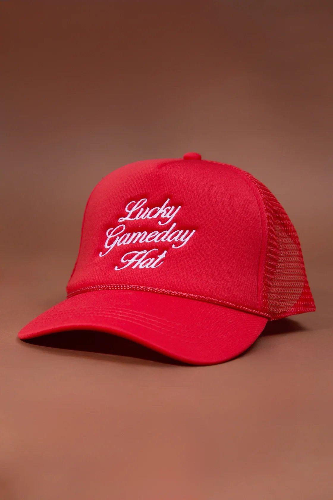 red trucker hat with lucky gameday hat written