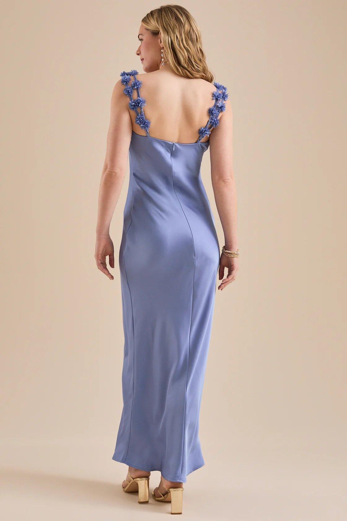 girl wearing a dust-blue satin dress
