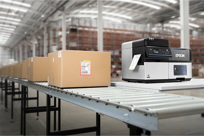 Boxes next to a machine on a conveyor belt