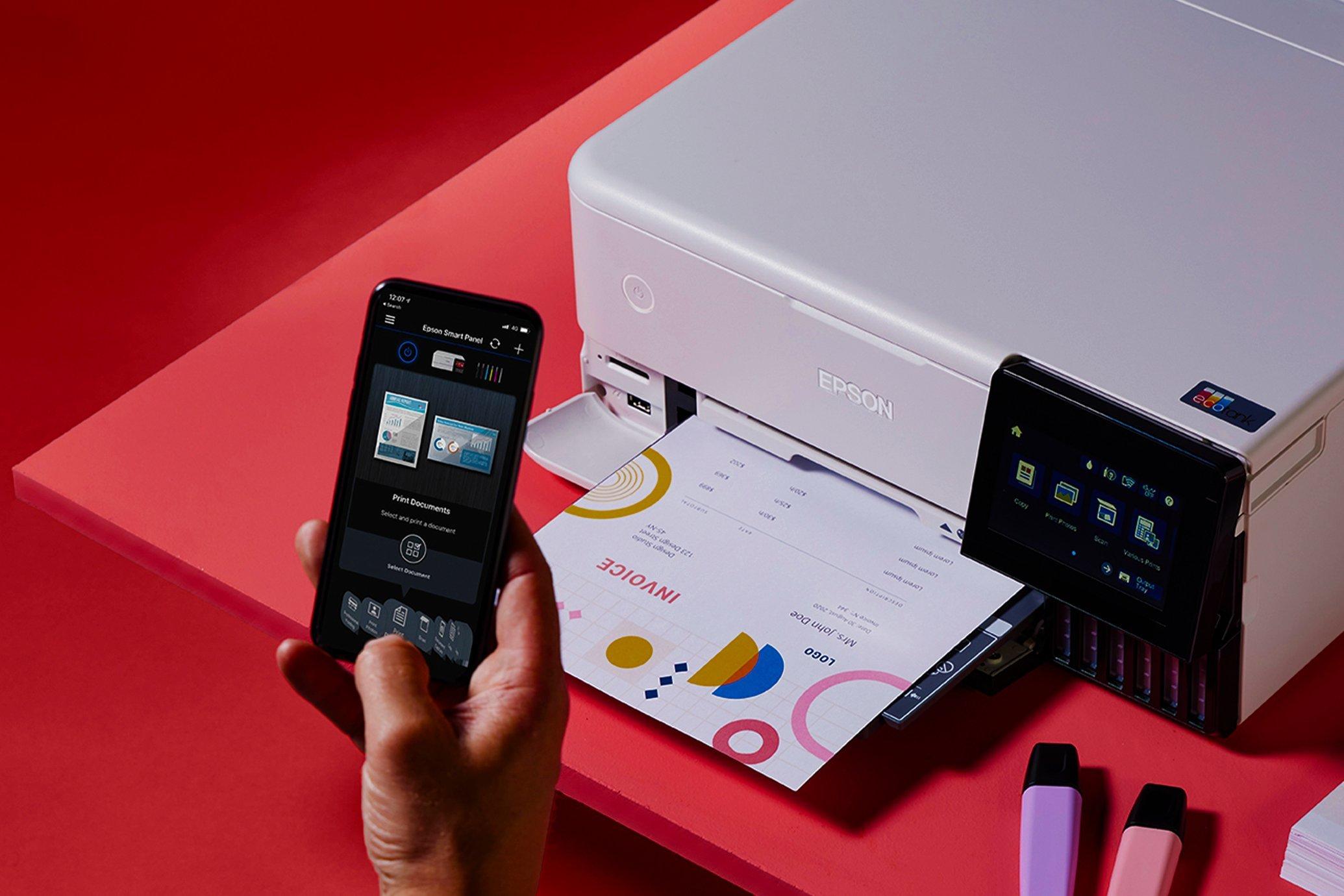 A person using their mobile phone to connect with an Epson printer