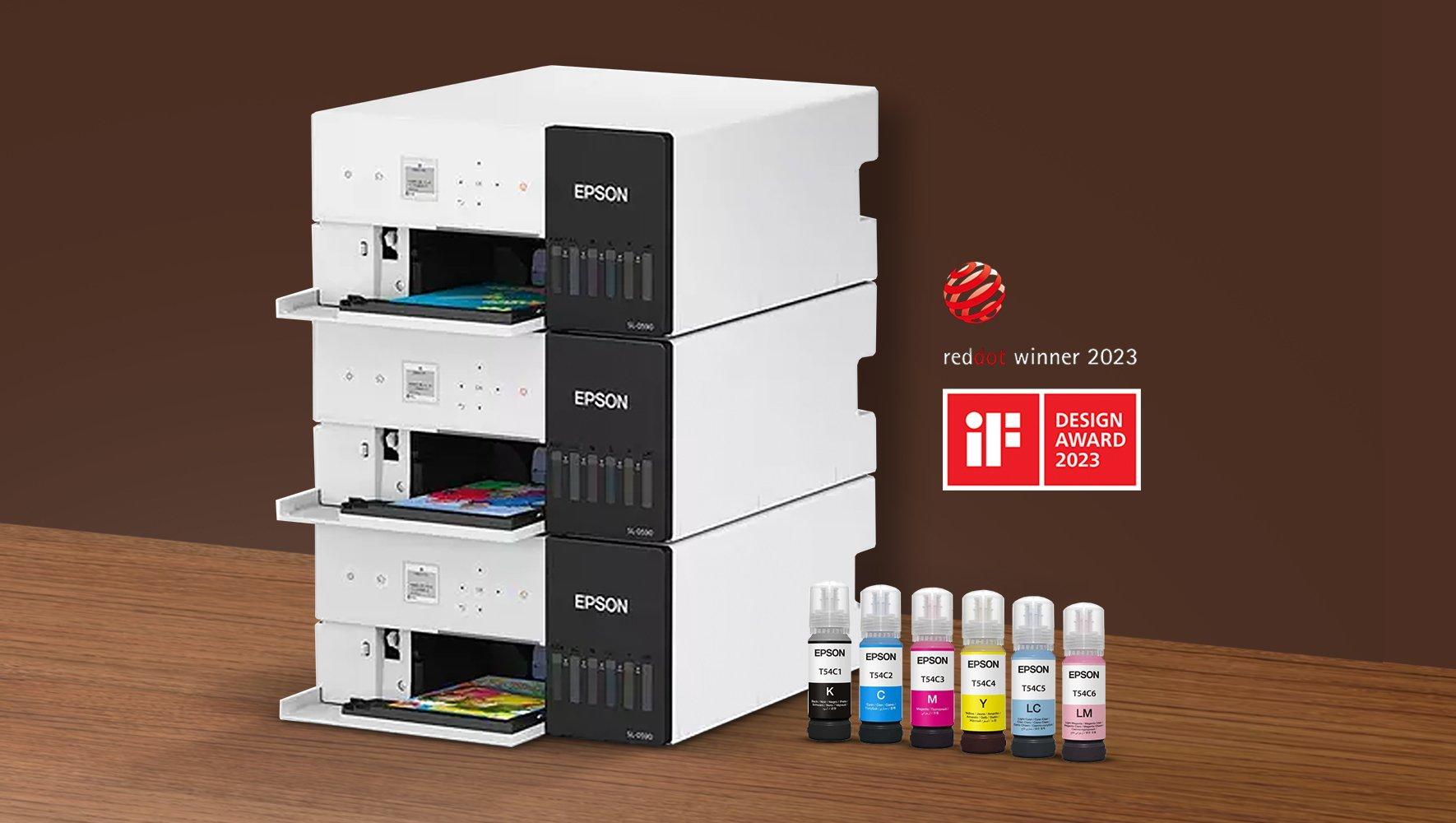 Stacked Epson printers and inks on the side, logo for reddot design awards winner 2023
