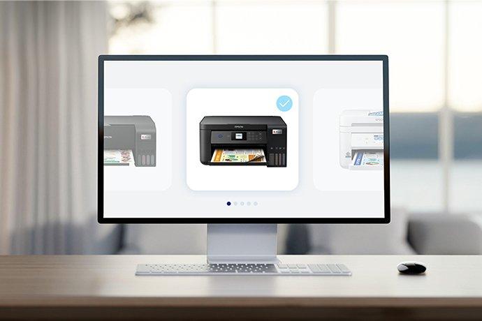 A monitor displaying an Epson printer in a bright lit room