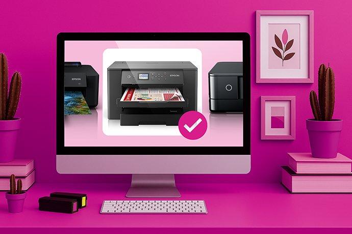 A computer on a pink background