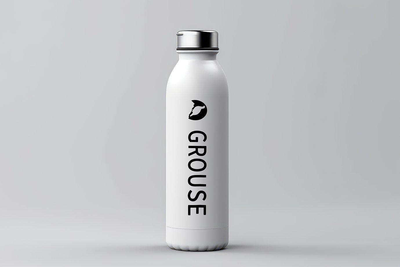 A sleek white reusable water bottle with a silver cap. 