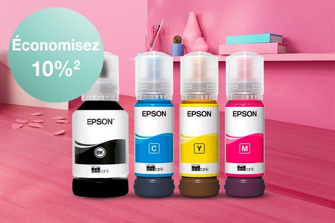 4 EcoTank Ink Bottles lined up against a pink desk and shelf, with paper hearts on the desk.