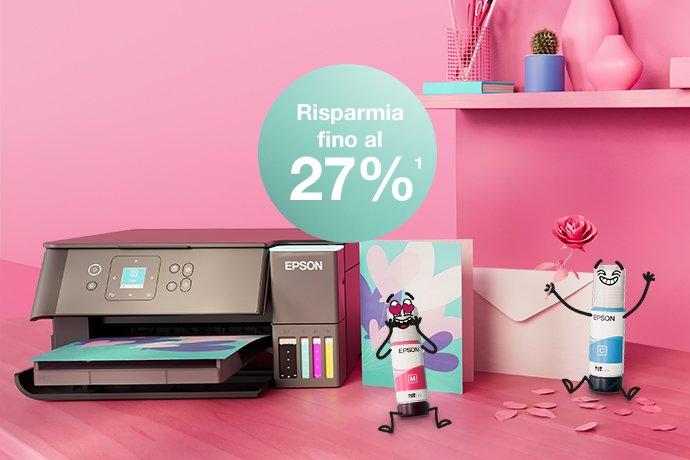 An Epson Printer with Inkies and postcards, a letter against a pink wall and a shelf with books and office materials in different colours.