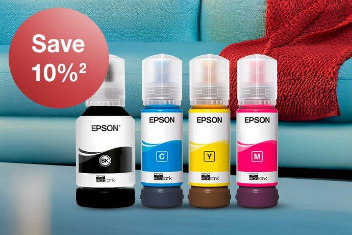Four Epson EcoTank Ink bottles in different colours with a blue couch and red blanket in the background