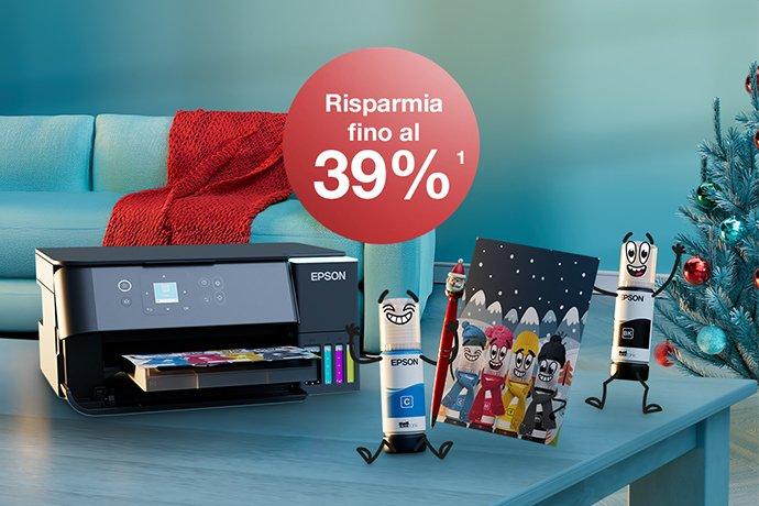 An Epson printer with Inkies and a Christmas card on a blue table with a Christmas tree in the back