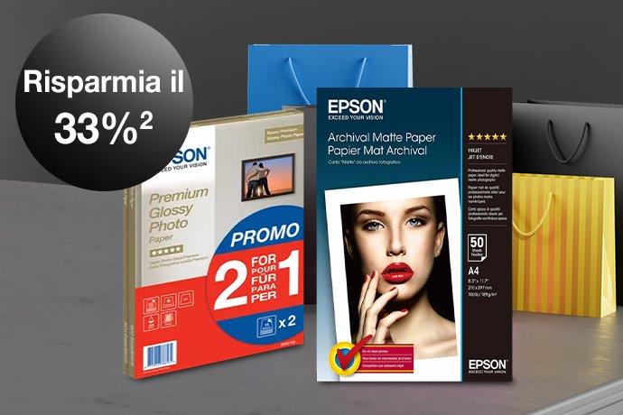 Two Epson Paper packs against a black and grey background and colorful paper bags behind them