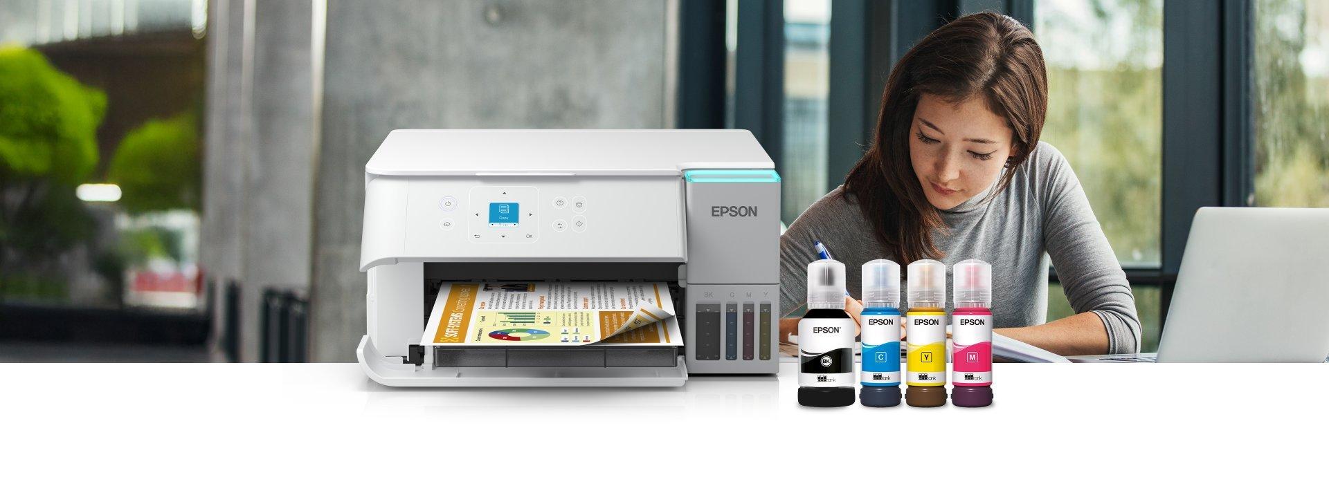 An Epson printer and Epson ink bottle, overlayed over a student studying.