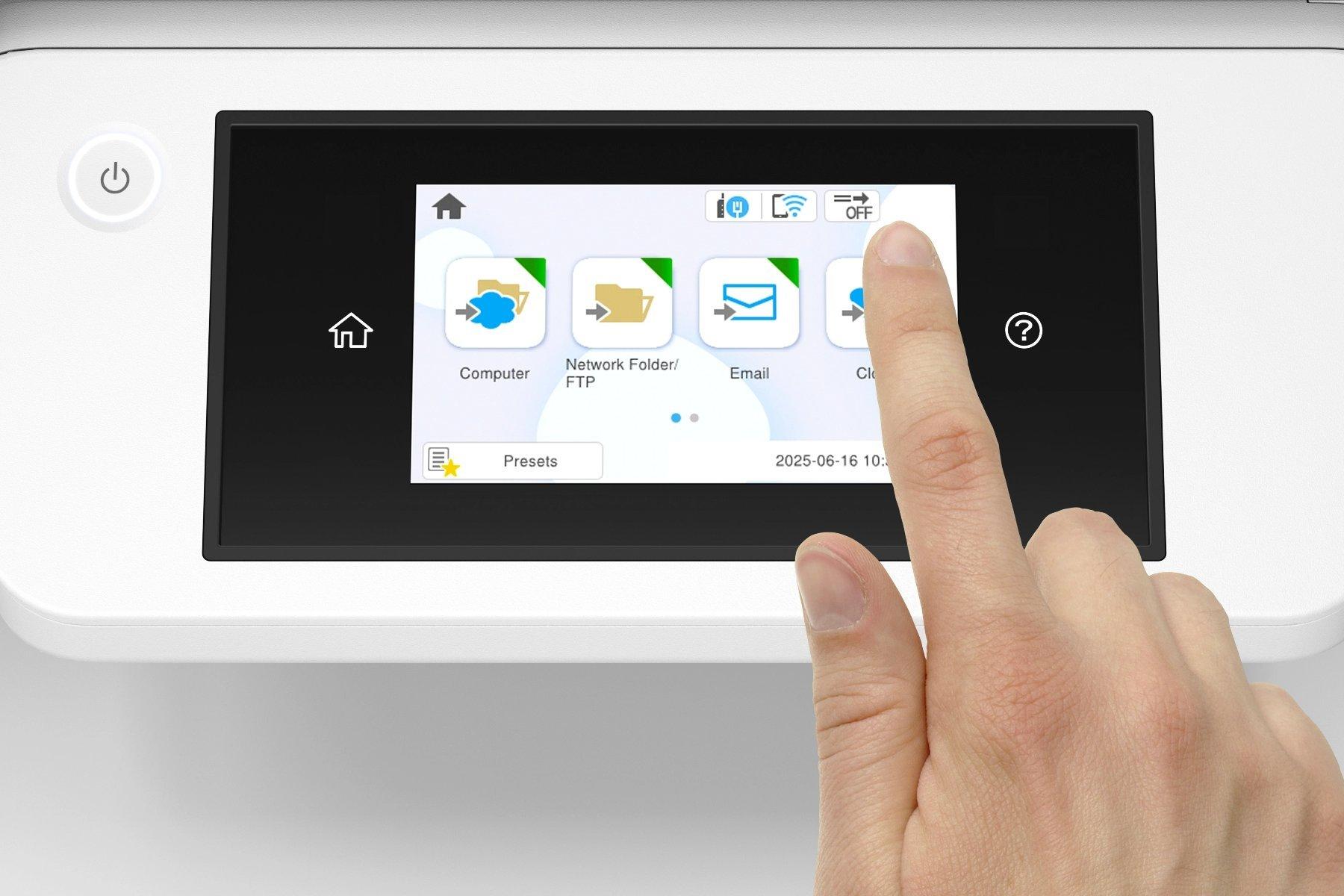 A hand pressing a touchscreen printer