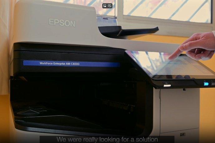 Someone using the smart display on an Epson printer.