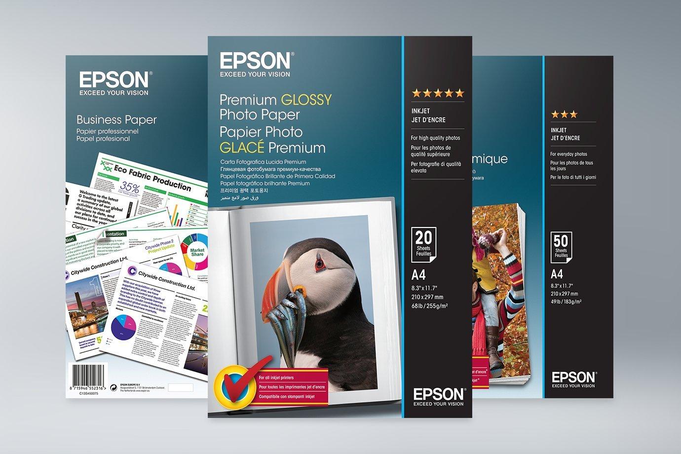 Three packs of Epson paper displayed