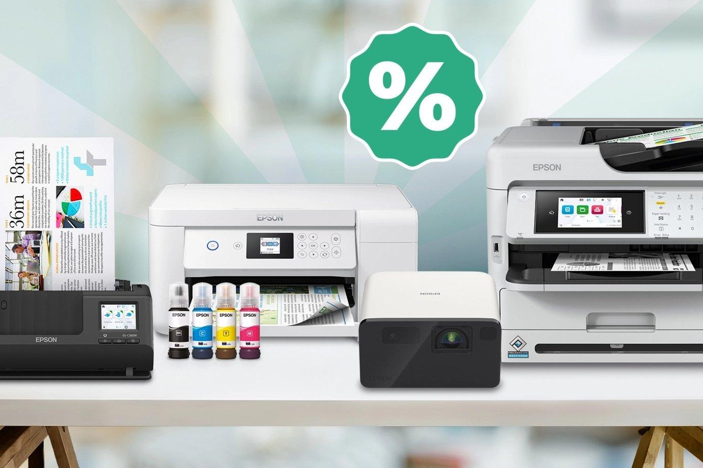 Printers and projector on a table with colorful ink bottles. A percentage symbol above suggests a discount. Bright, modern office setting.
