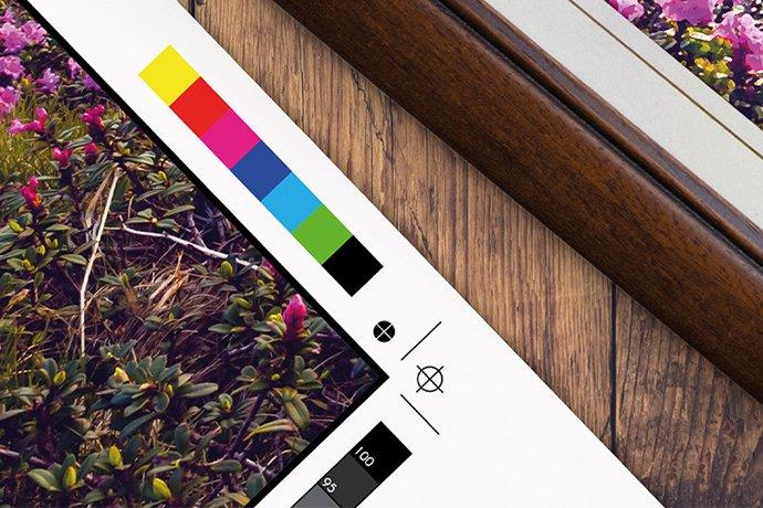 A print of flowers on a wooden canvas