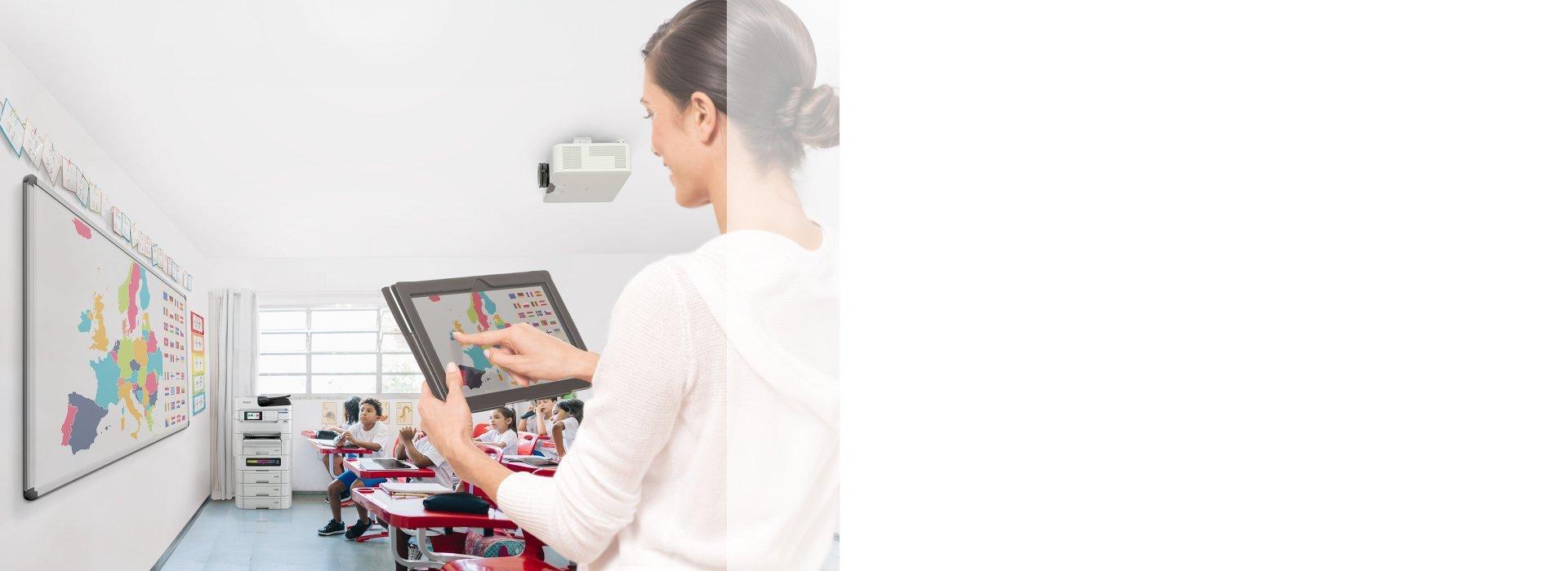 Woman using an tablet to control a smart projector.