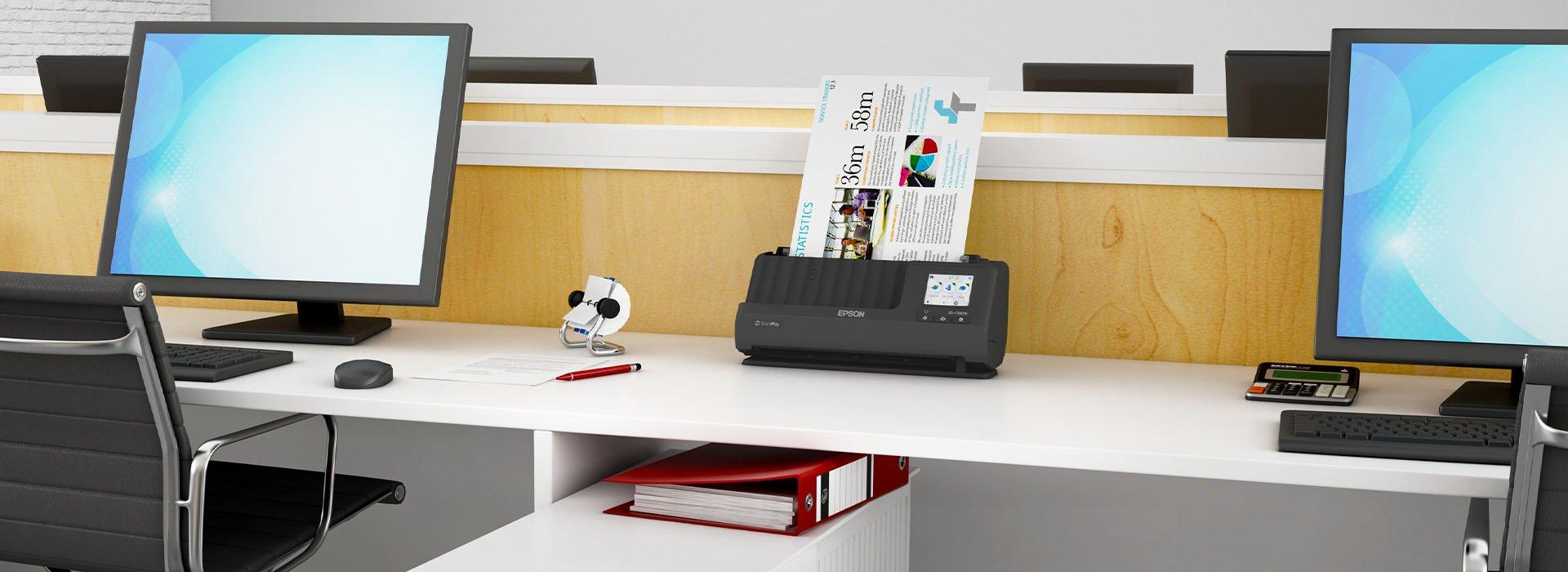 A compact desk scanner in an office environment