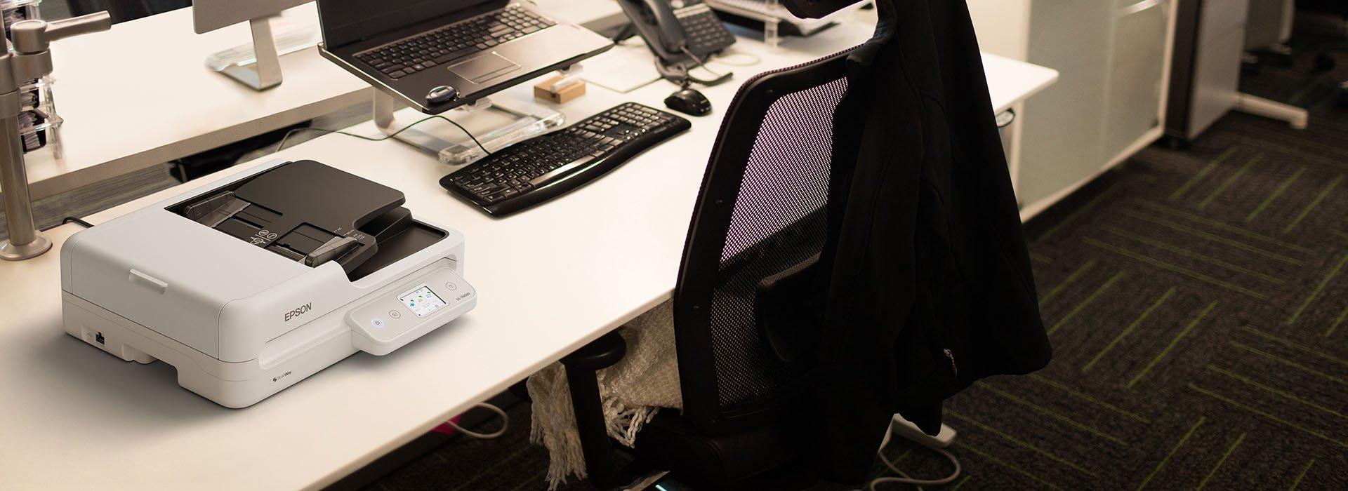 A flatbed scanner in an office environment