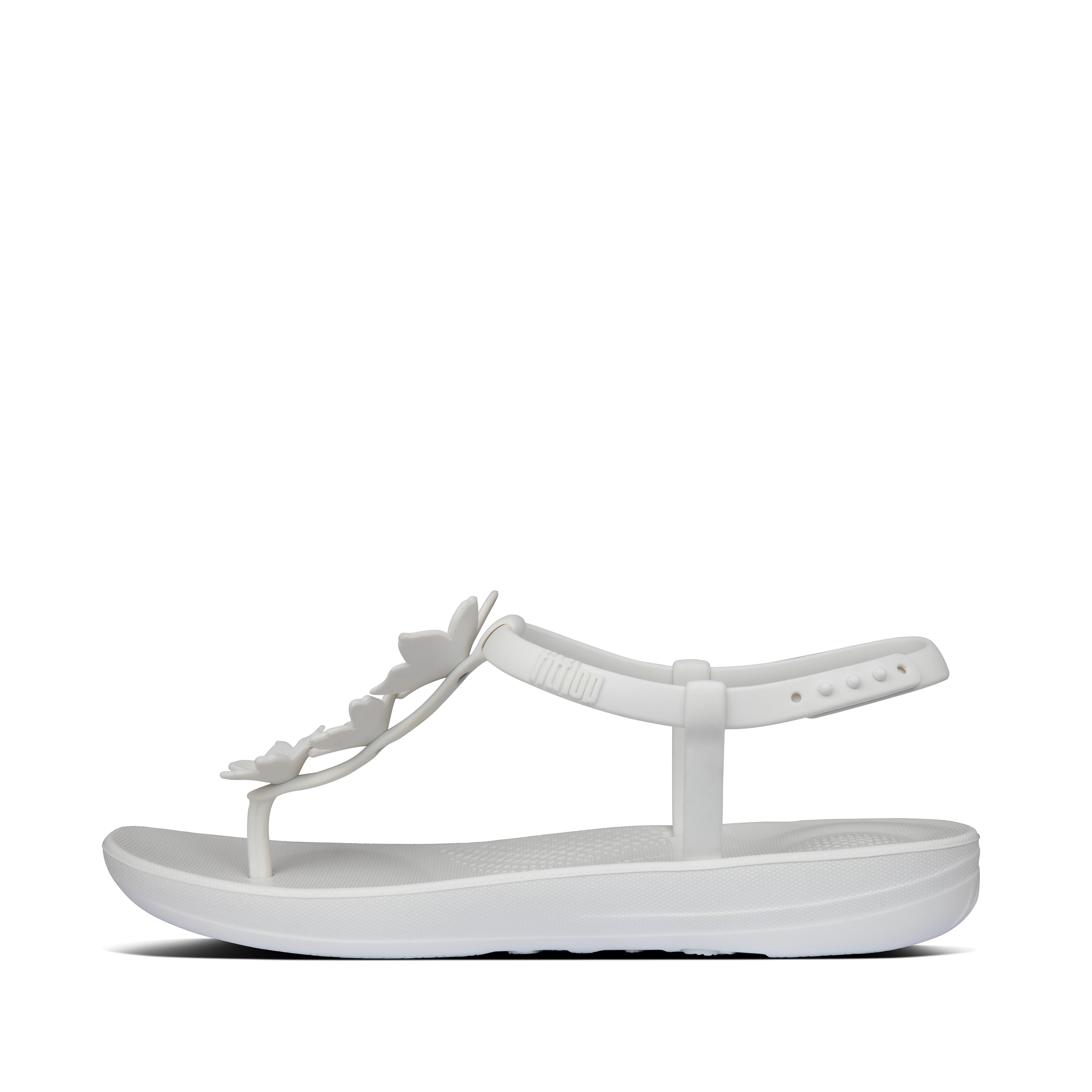 white rubber flip flops