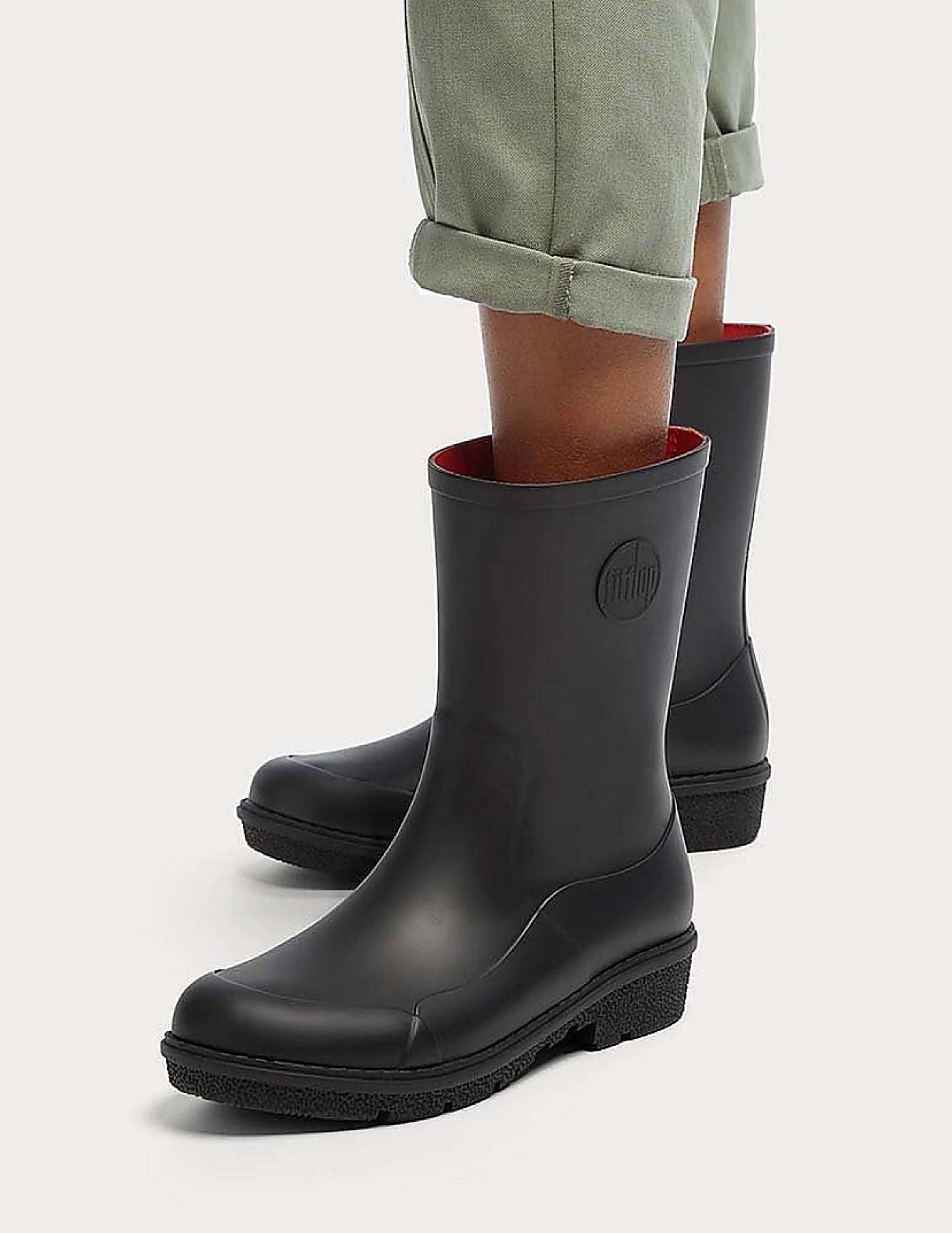 The Best Wellies for Women - Woman Wearing WonderWelly Boots In Black