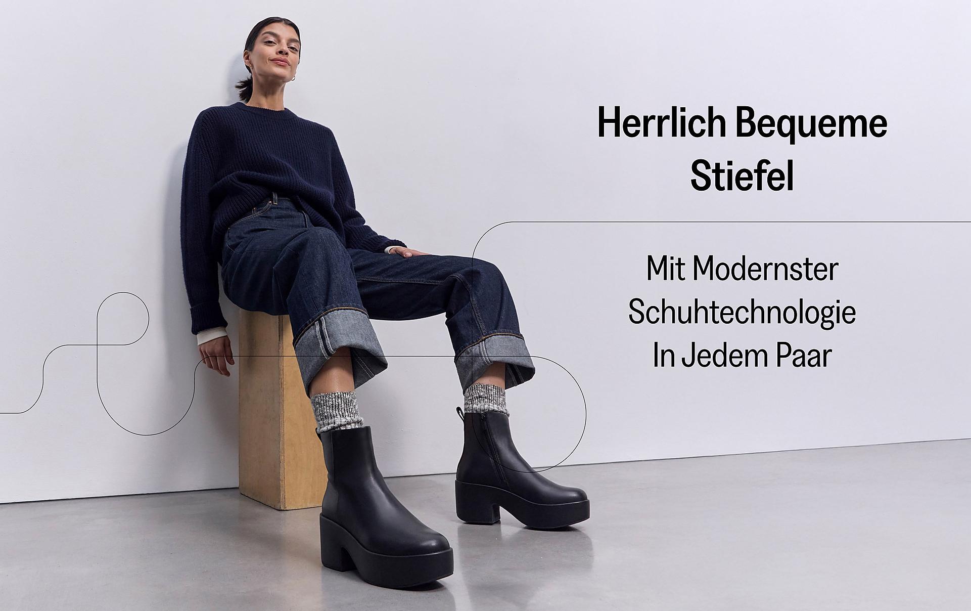 Woman Wearing sitting on a chair wearing PLATFFORMS Leather Heeled Ankle Boots From FitFlop