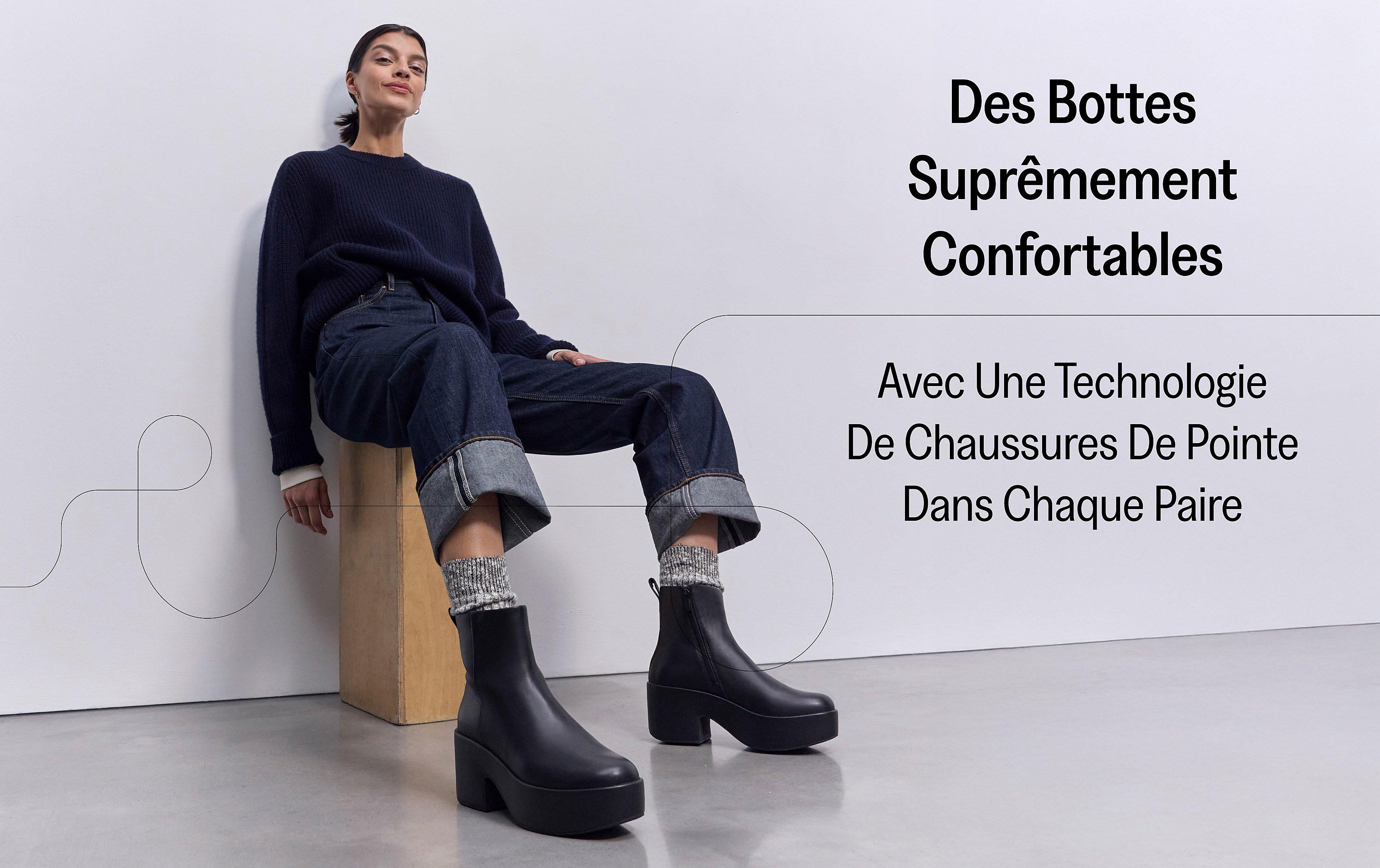 Woman Wearing sitting on a chair wearing PLATFFORMS Leather Heeled Ankle Boots From FitFlop