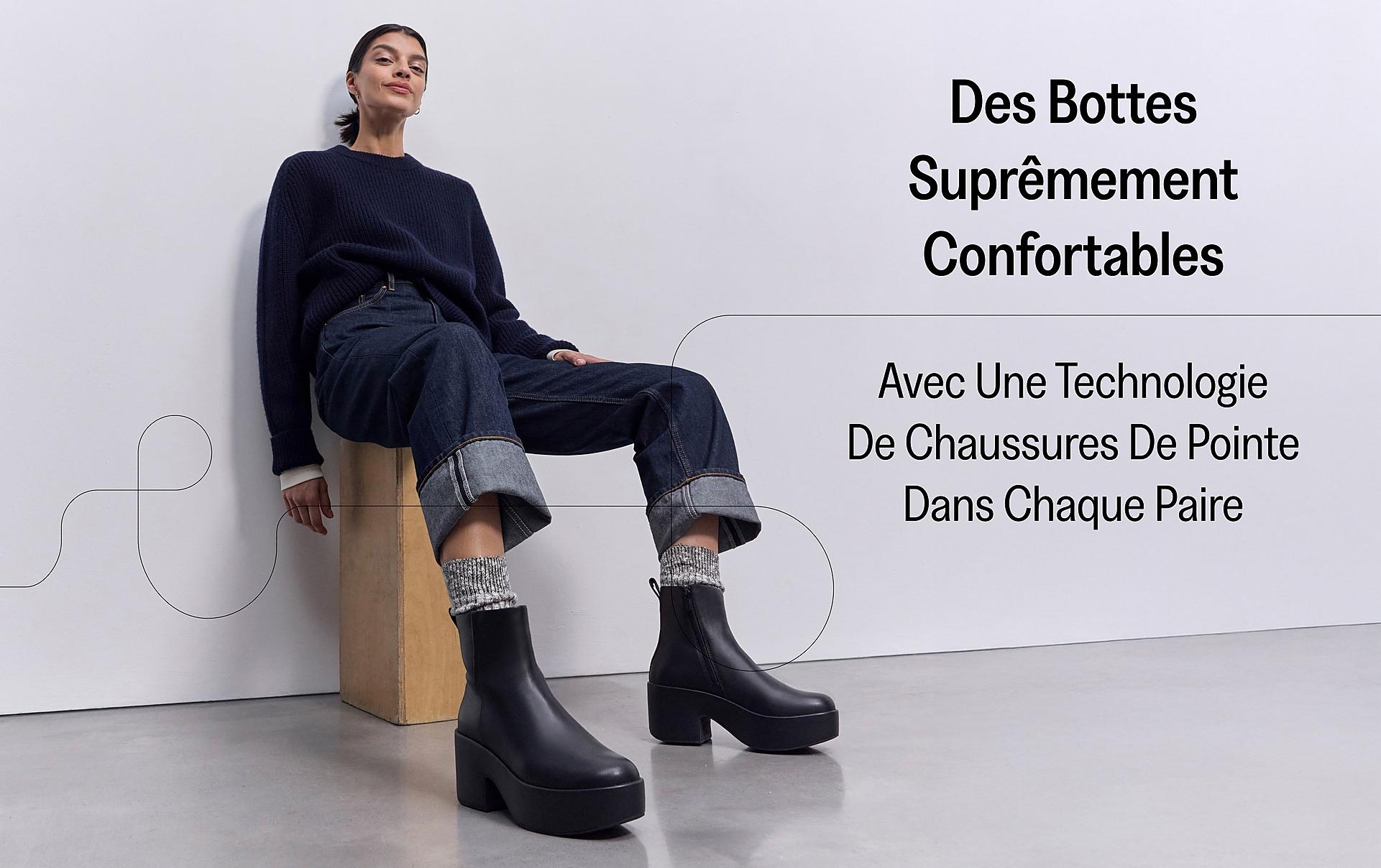 Woman Wearing sitting on a chair wearing PLATFFORMS Leather Heeled Ankle Boots From FitFlop