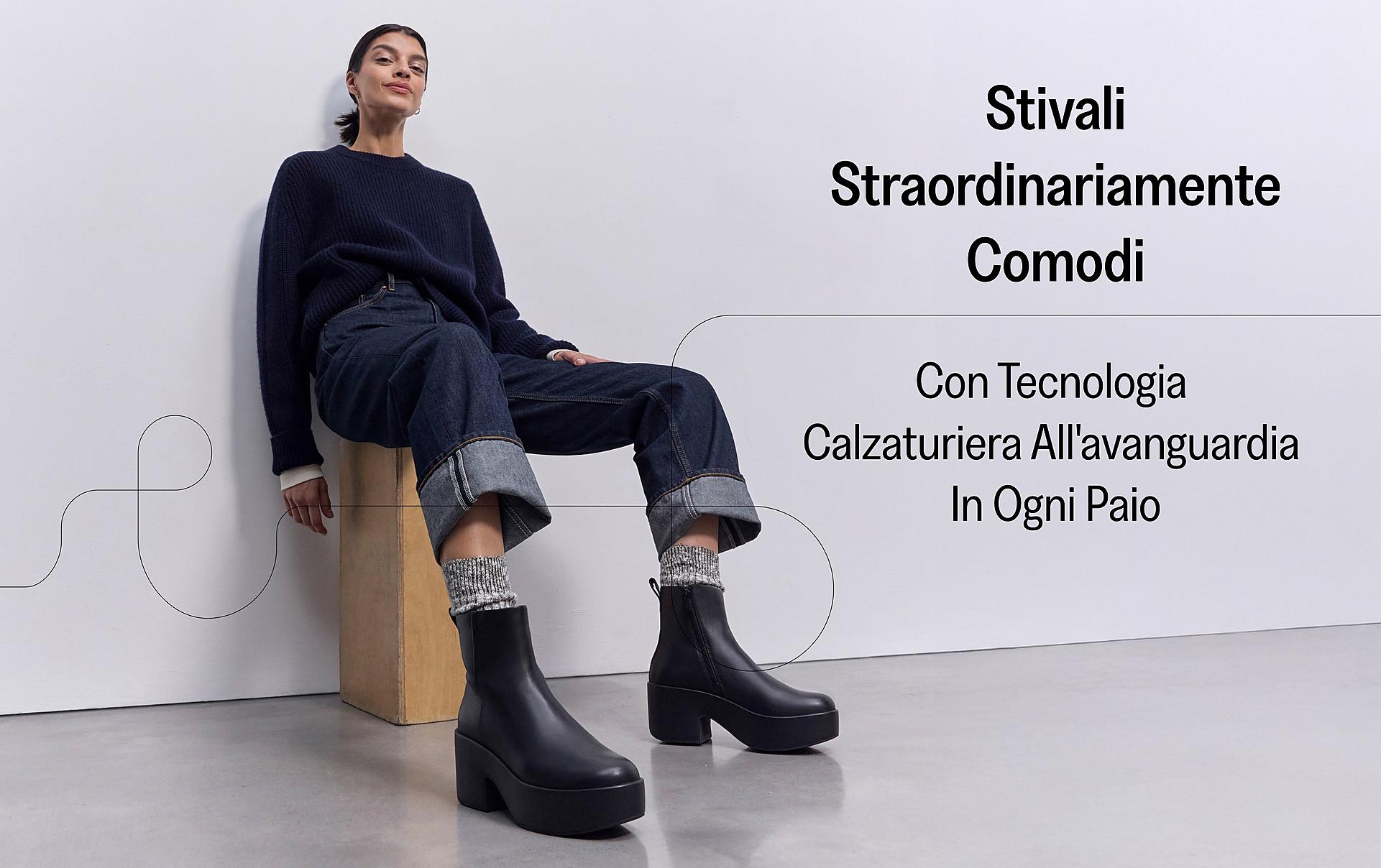 Woman Wearing sitting on a chair wearing PLATFFORMS Leather Heeled Ankle Boots From FitFlop