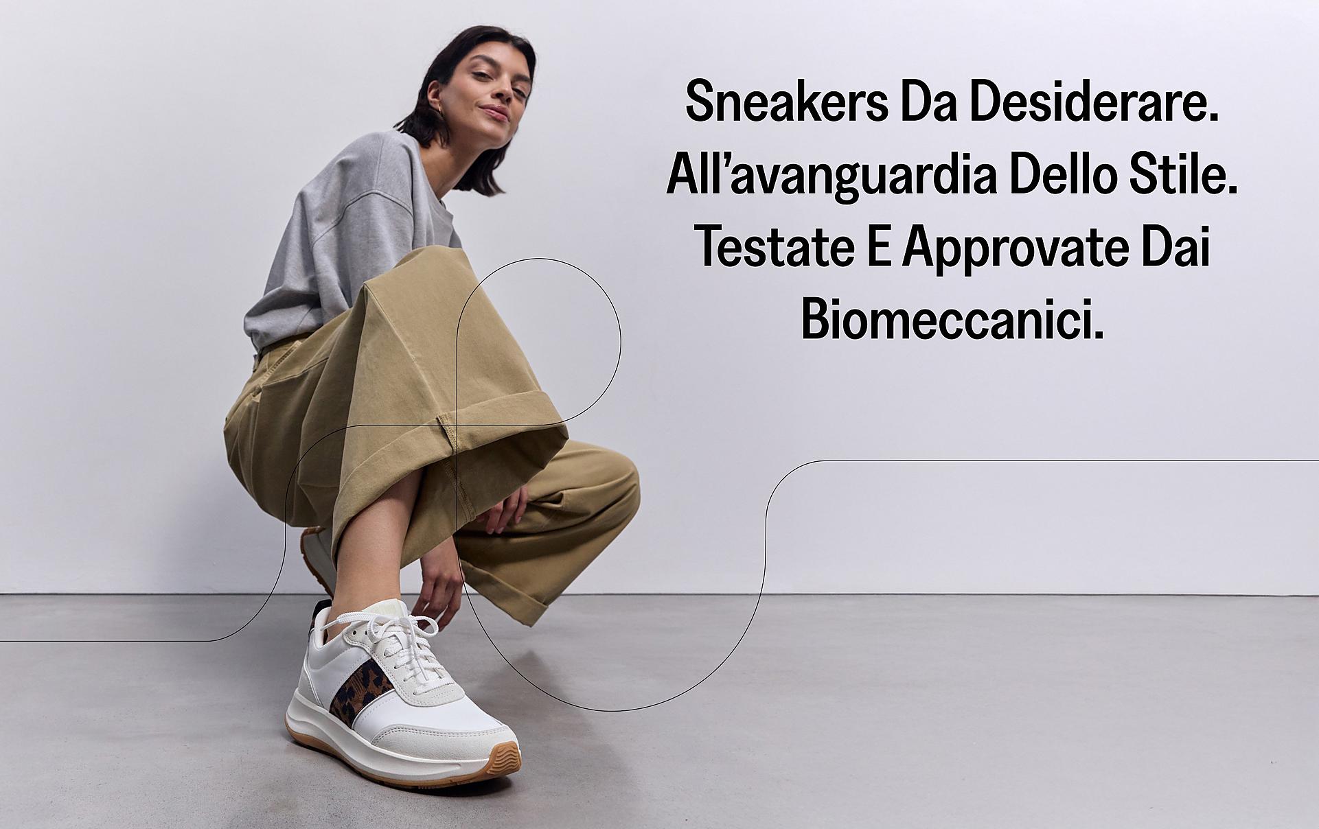 model squatting down wearing fmode leopard print sneakers from fitflop