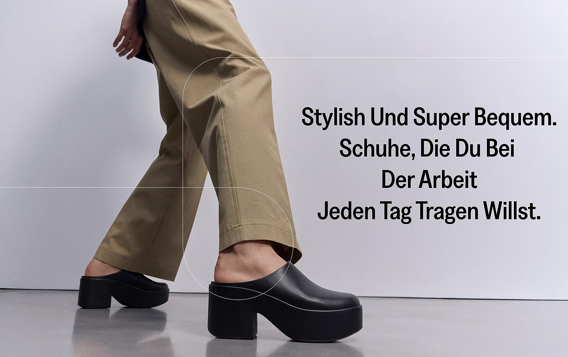 woman wearing PLATFFORMS Suede Heeled Mules from FitFlop