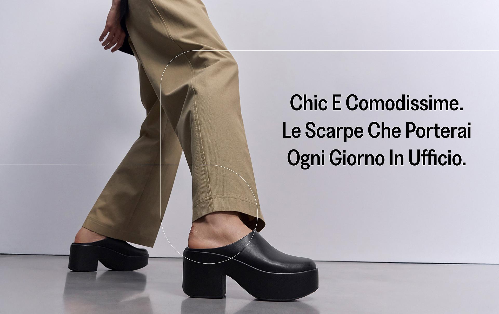 woman wearing PLATFFORMS Suede Heeled Mules from FitFlop