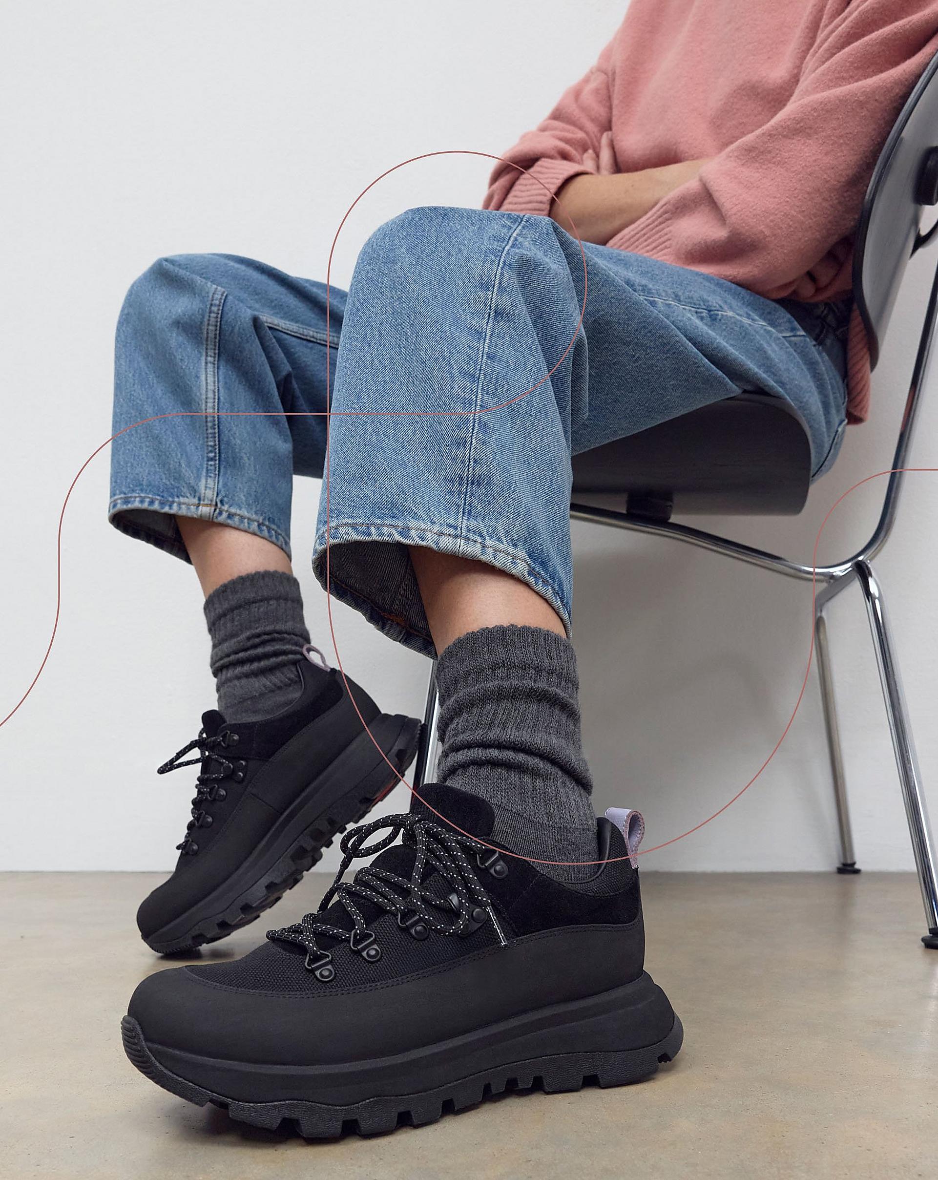 Woman wearing rtg metalic trainers