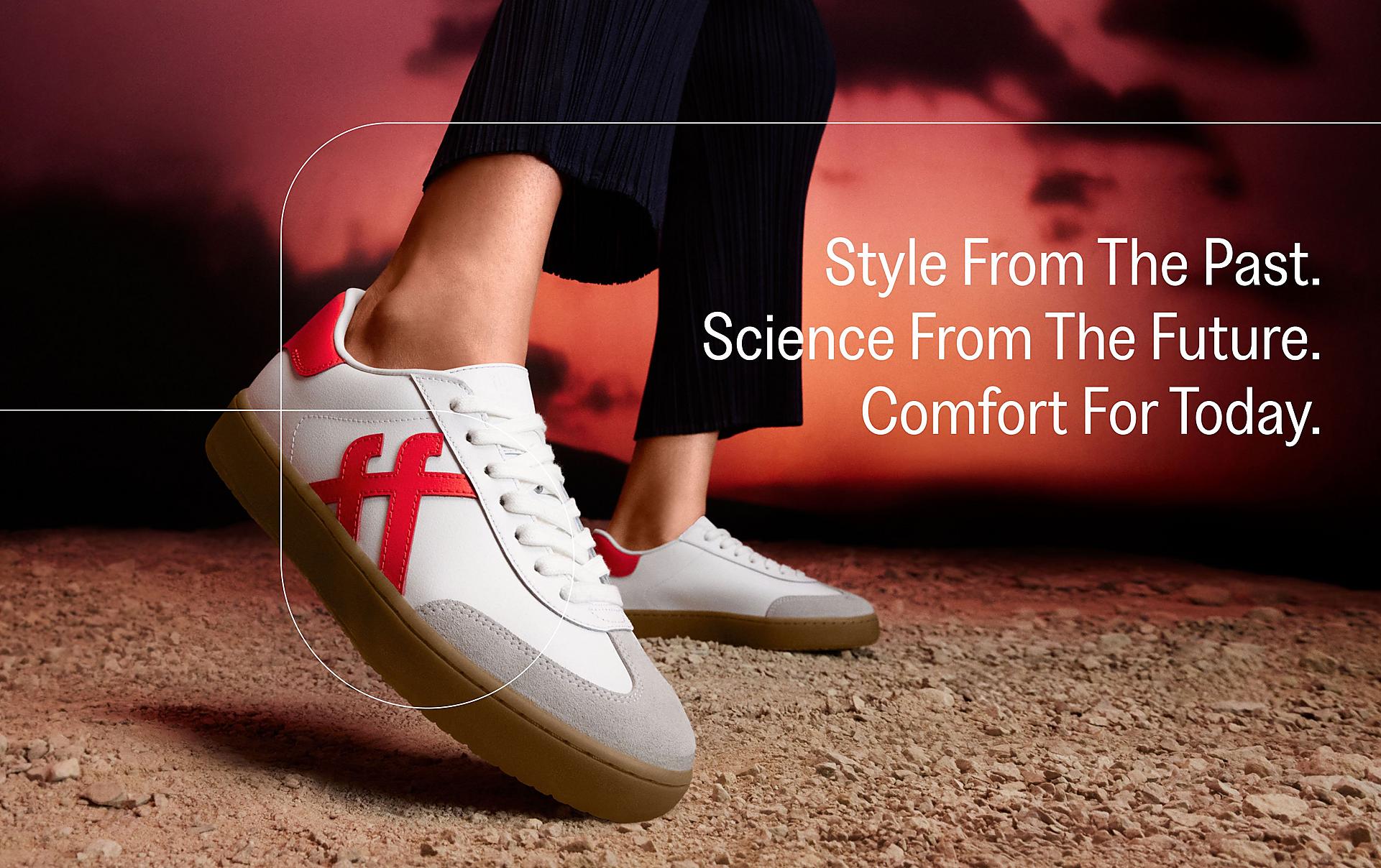 model squatting down wearing fmode leopard print sneakers from fitflop