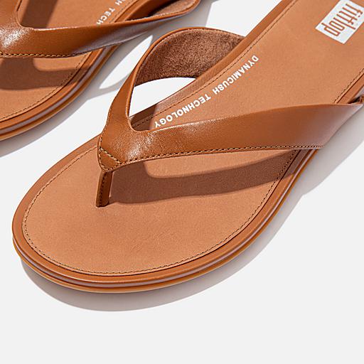 【MODERNIF】Toffee Leather Flip Flops Tkees Women's Foundations Matte Flip Flop | $60.00 | Saint