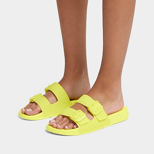 https://i8.amplience.net/i/fitflop/IQUSHION-GLOW-IN-THE-DARK-TWO-BAR-BUCKLE-SLIDES-LIME-JUICE_GO5-A74_1?v=1&w=512&$pdp-img-gallery$