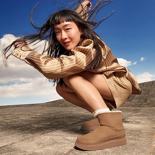 Woman wearing Shearling FitFlop boots