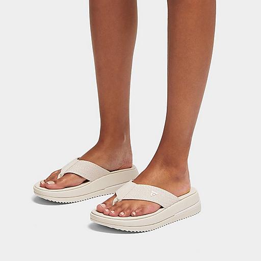 Flip flops with top fabric toe post