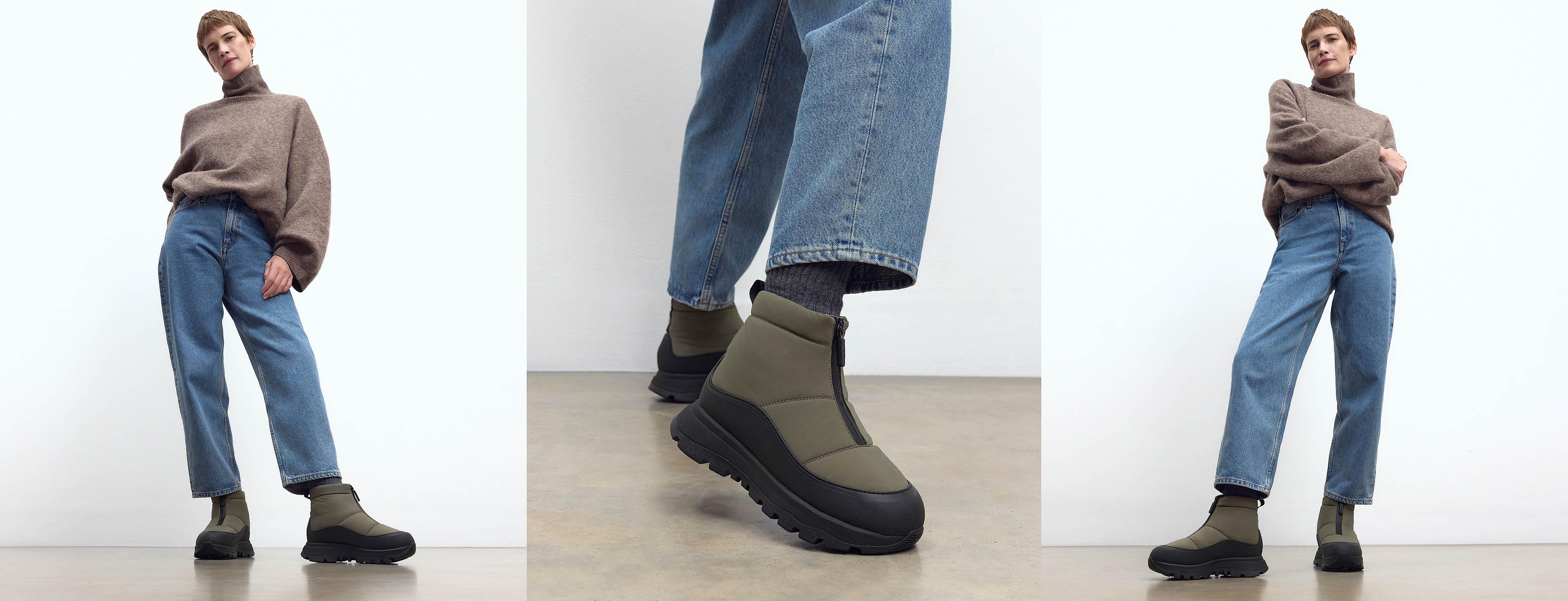 A female model wearing and styling the Neo-D Hyker Sip-Front Boot in Olive Green