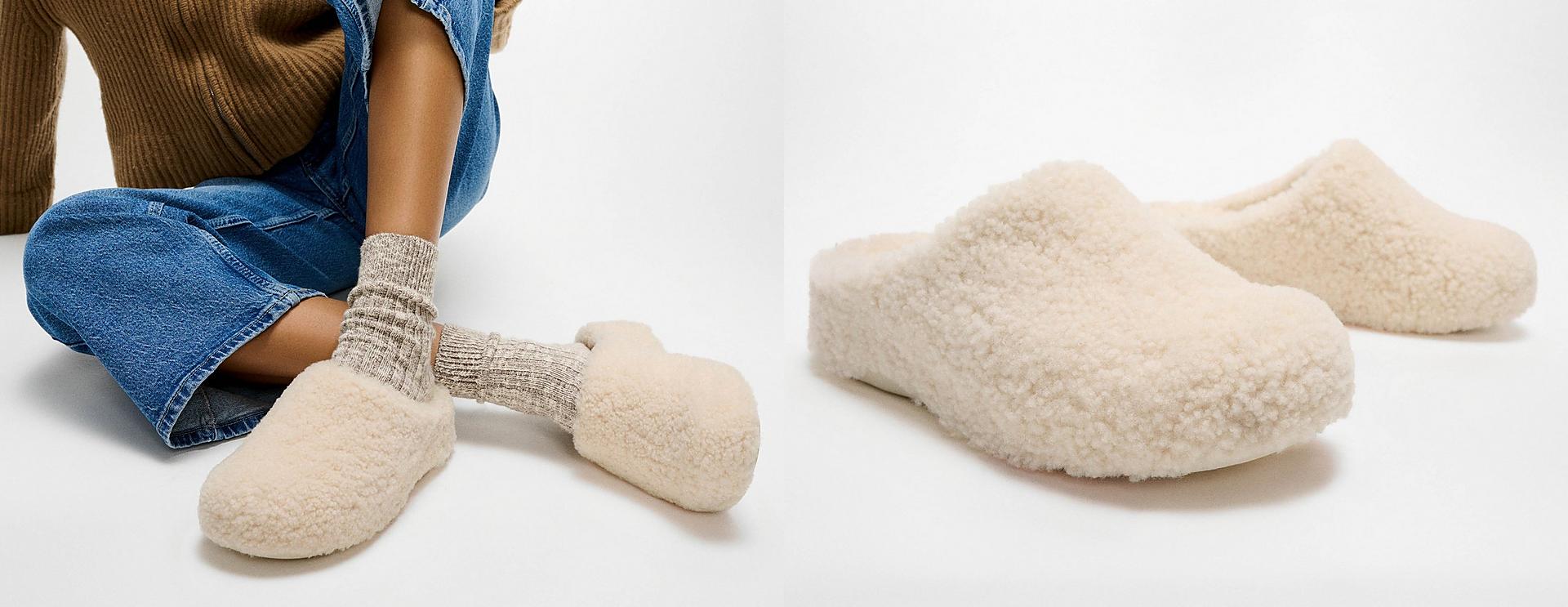 A female model styling and wearing SHUV shearling slippers in Ivory