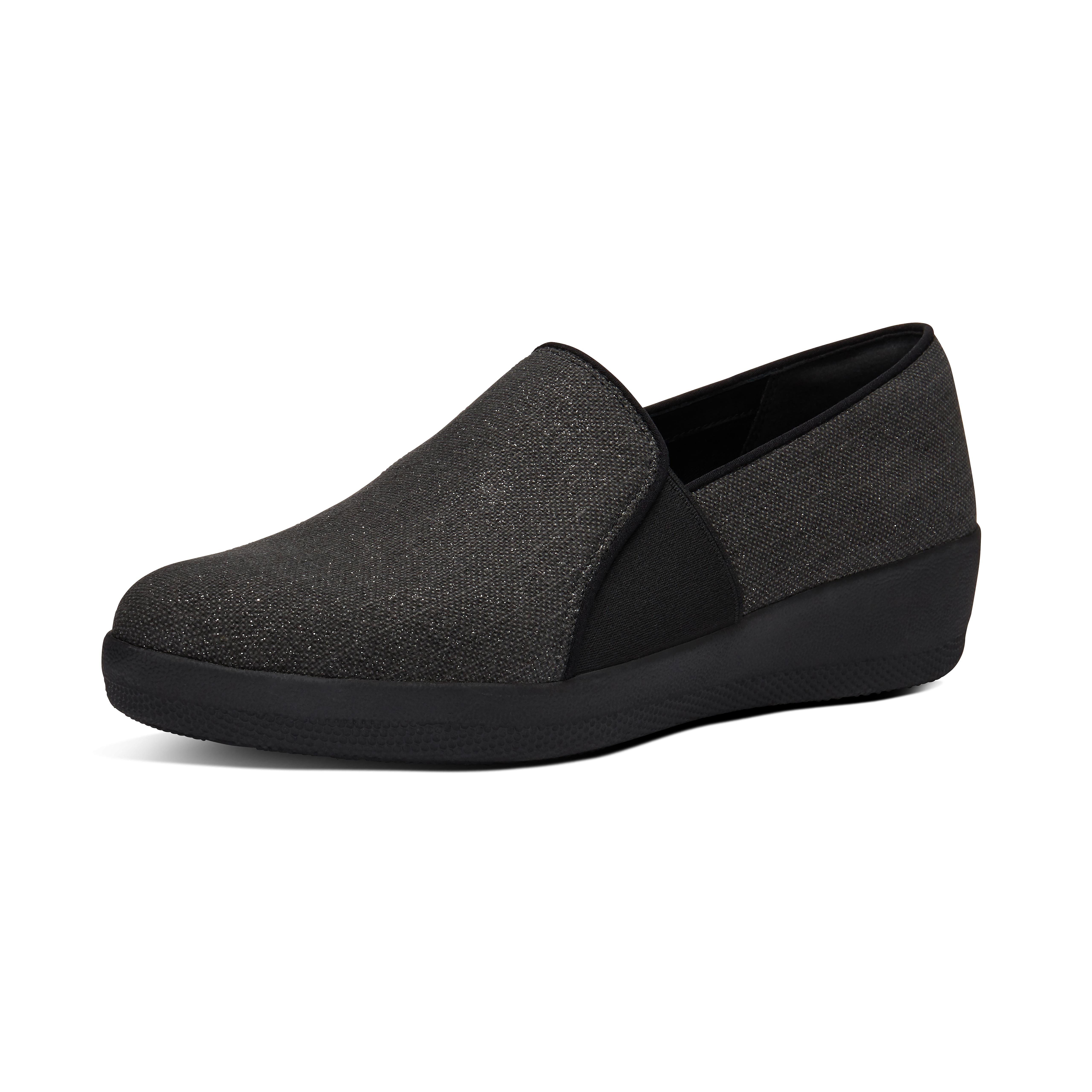 black canvas slip on trainers