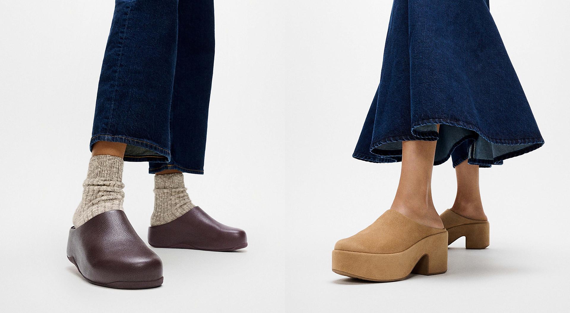 A model wearing a pair of platform clogs in a camel brown colour