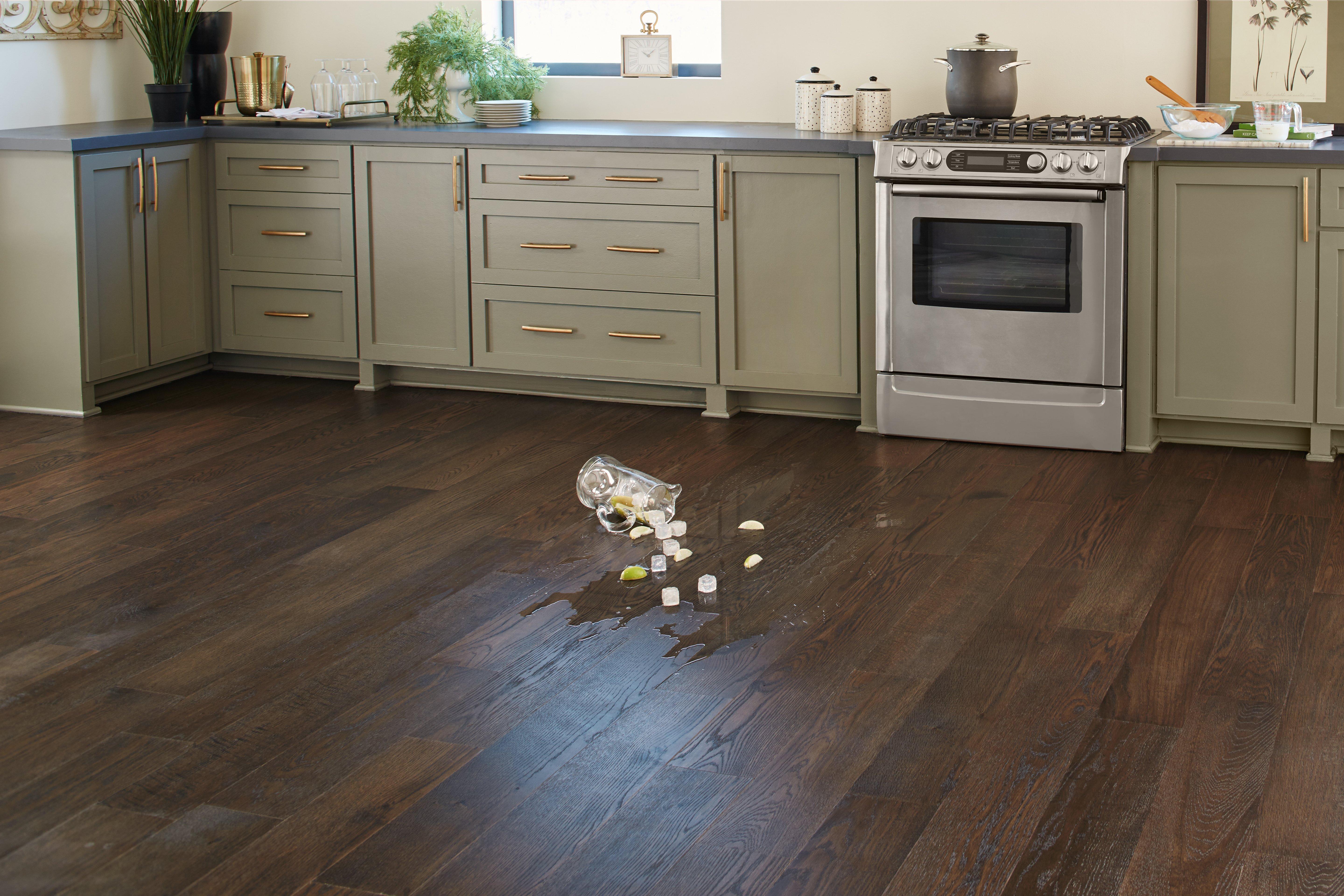 https://i8.amplience.net/i/flooranddecor/100503226_albion0118-aquaguard-brushed-gray-oak-wire-brushed-water-resistant-engineered-hardwood-spill-kitchen_room?fmt=auto&qlt=85