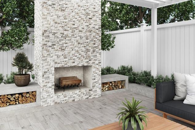 Outdoor fireplace with travertine ledger panel