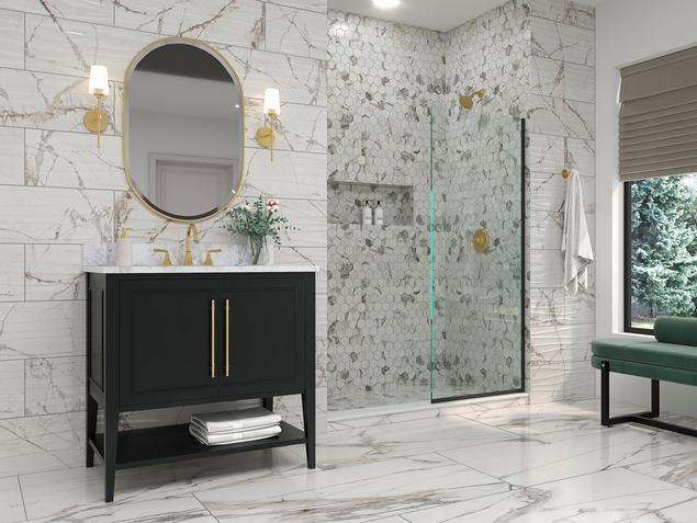A bathroom with a single vanity, white marble flooring, and hexagon shower tile.