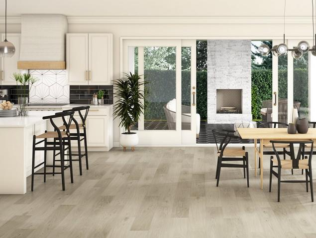 Kitchen with light oak hardwood floors.